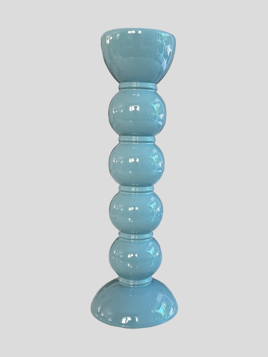 A tall bobbin shaped blue lacquer candlestick from Addison Ross