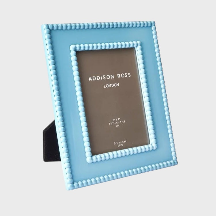 Light blue photo frame with Addison Ross London branding on a light gray background