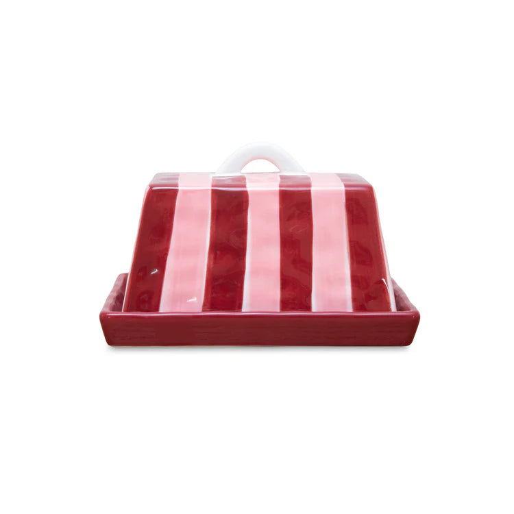 Red and white striped ceramic butter dish on a white background