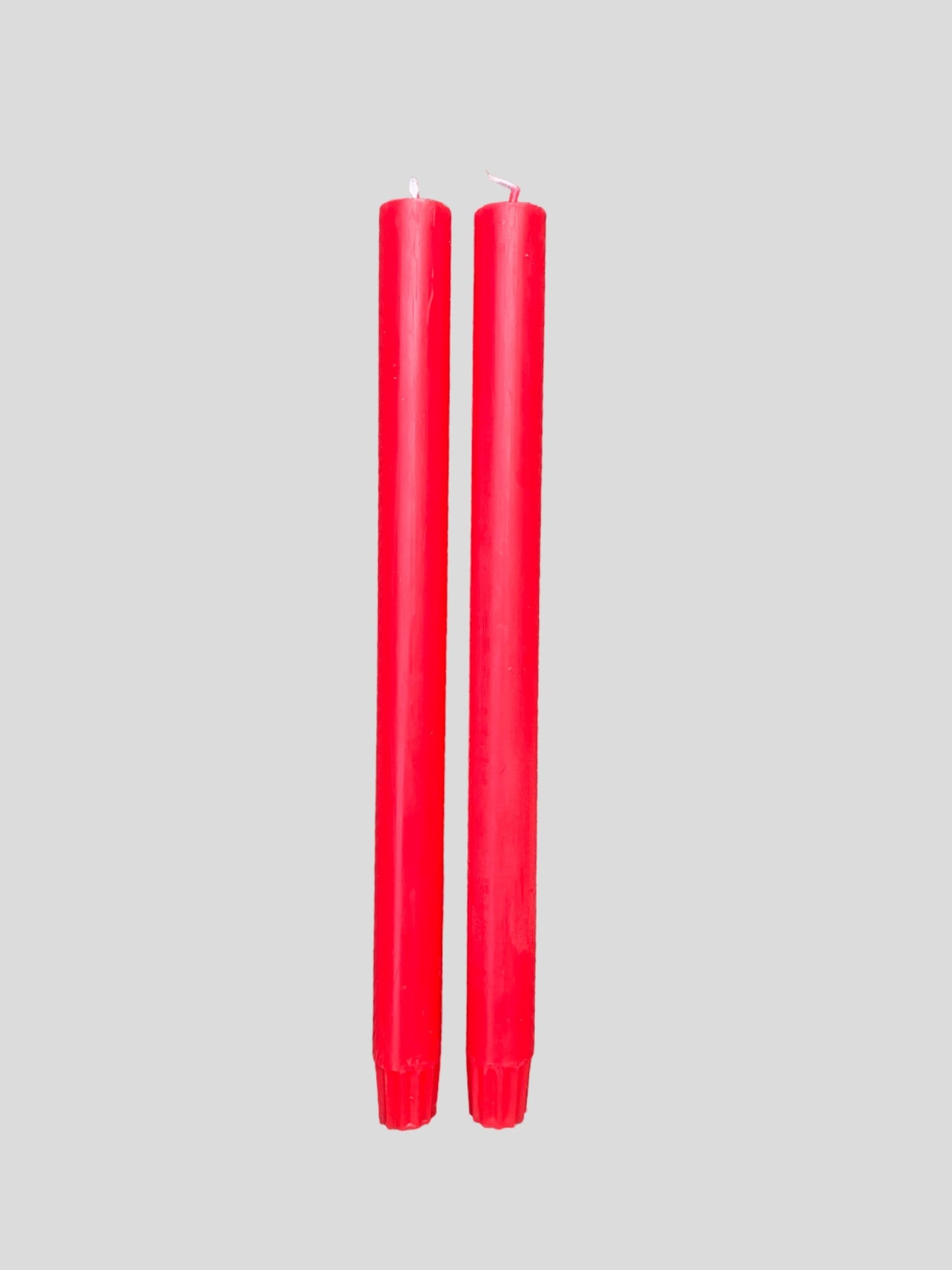 A pair of red candles from True Grace