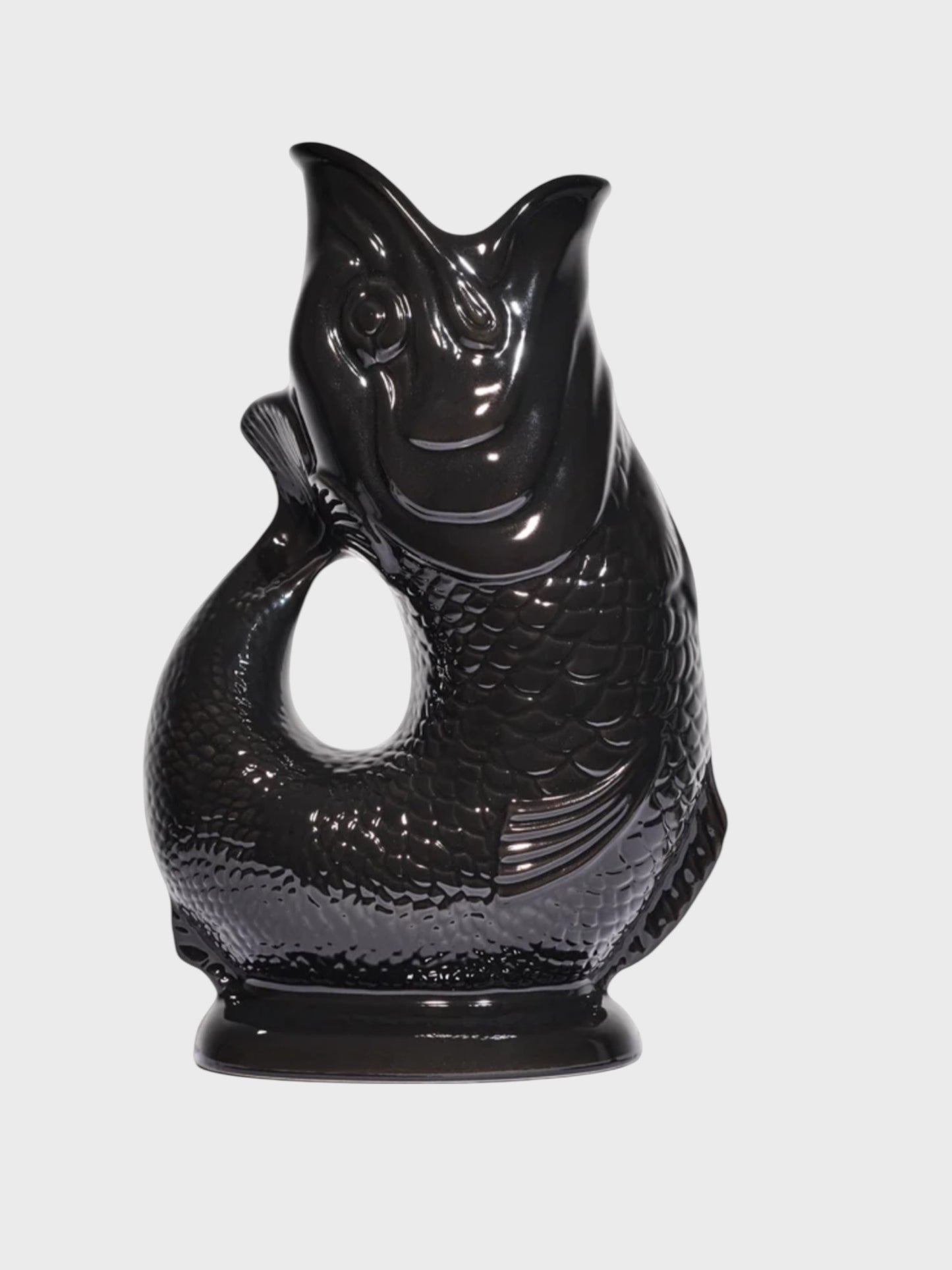 Black fish-shaped vase on a white background