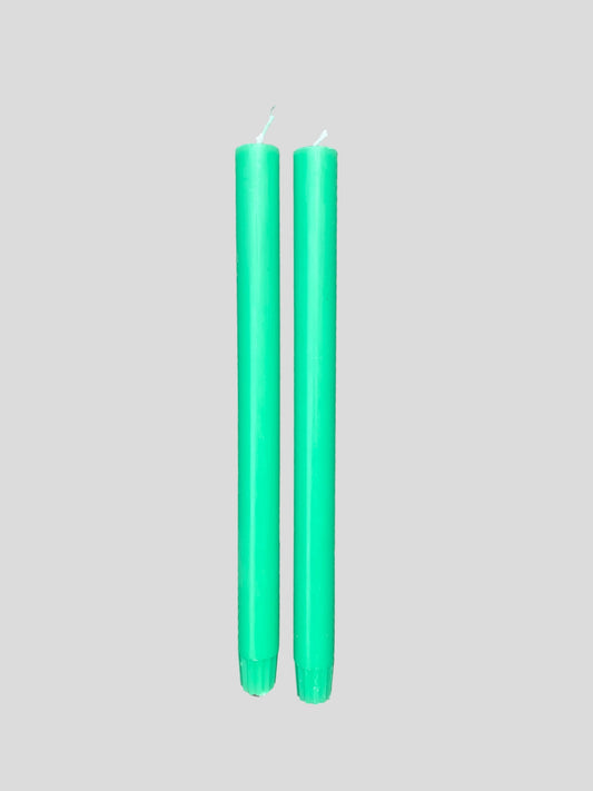 A pair of peppermint green candles from True Grace