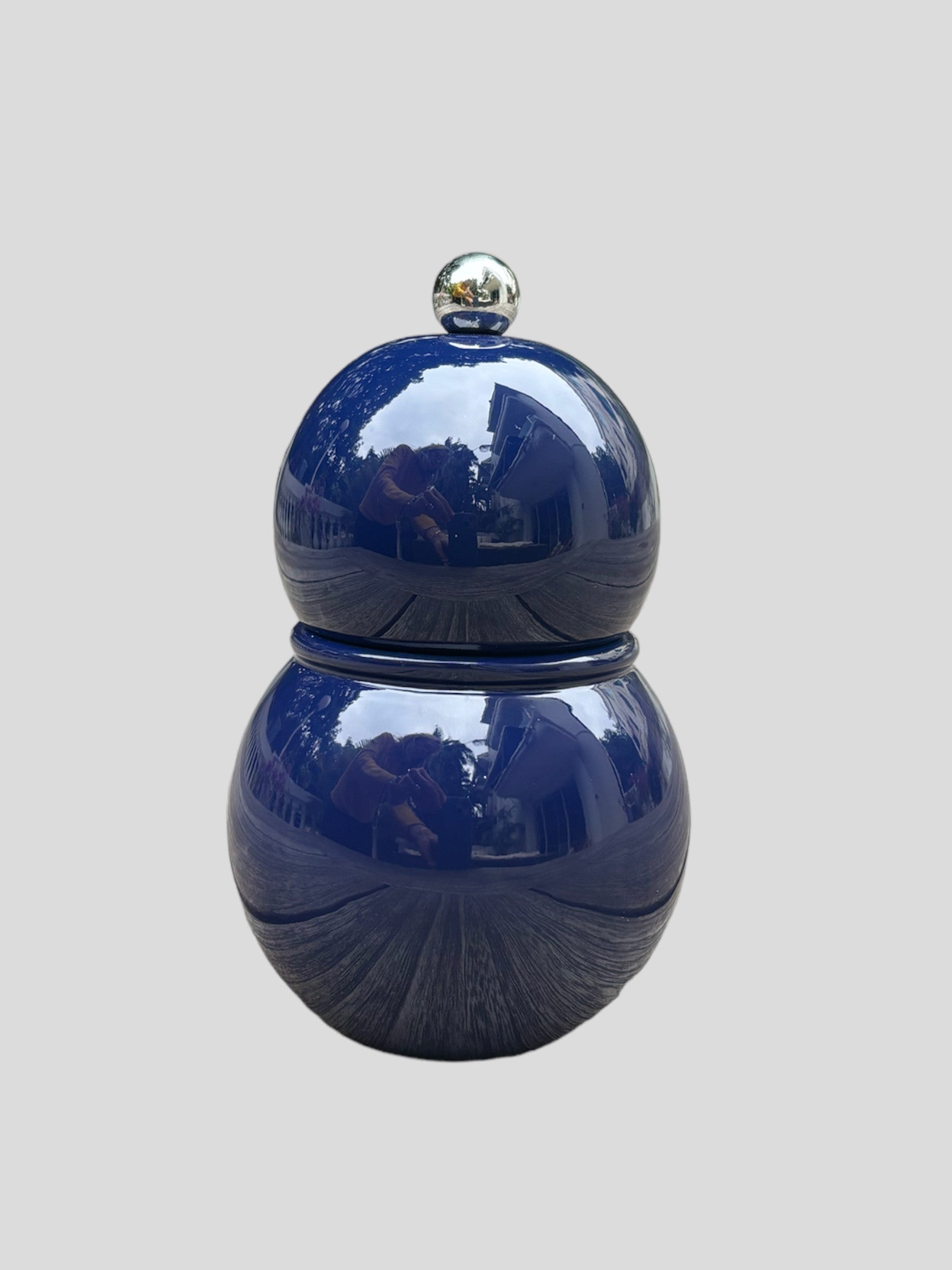 short, navy, bobbin shaped pepper grinder from Addison Ross.
