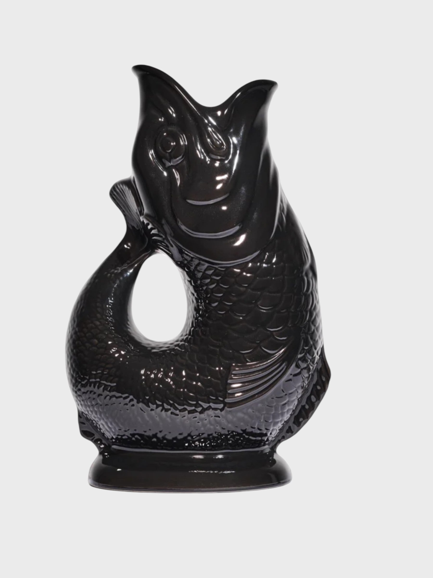 Black fish-shaped vase on a white background