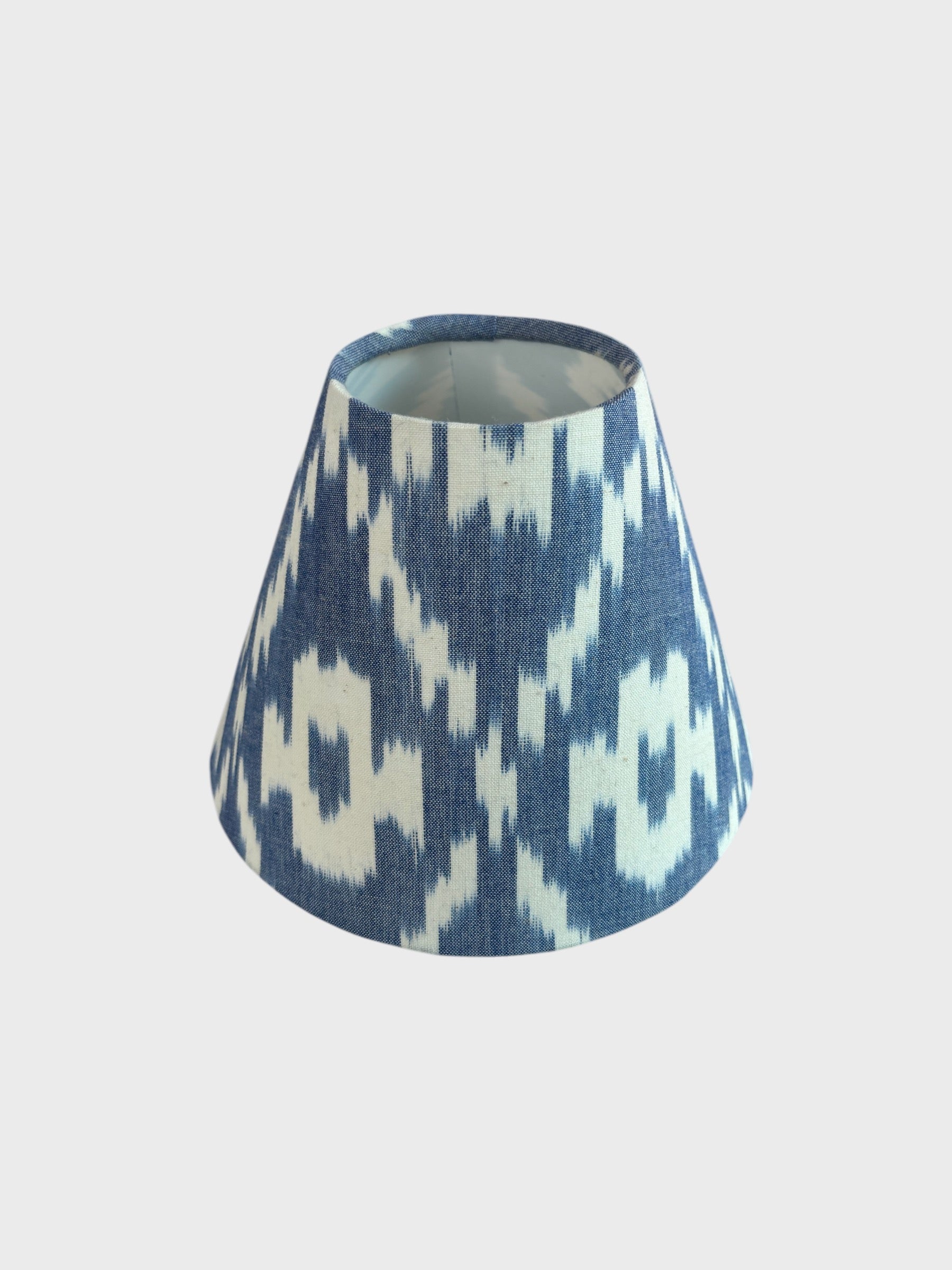 A handmade blue ikat lampshade