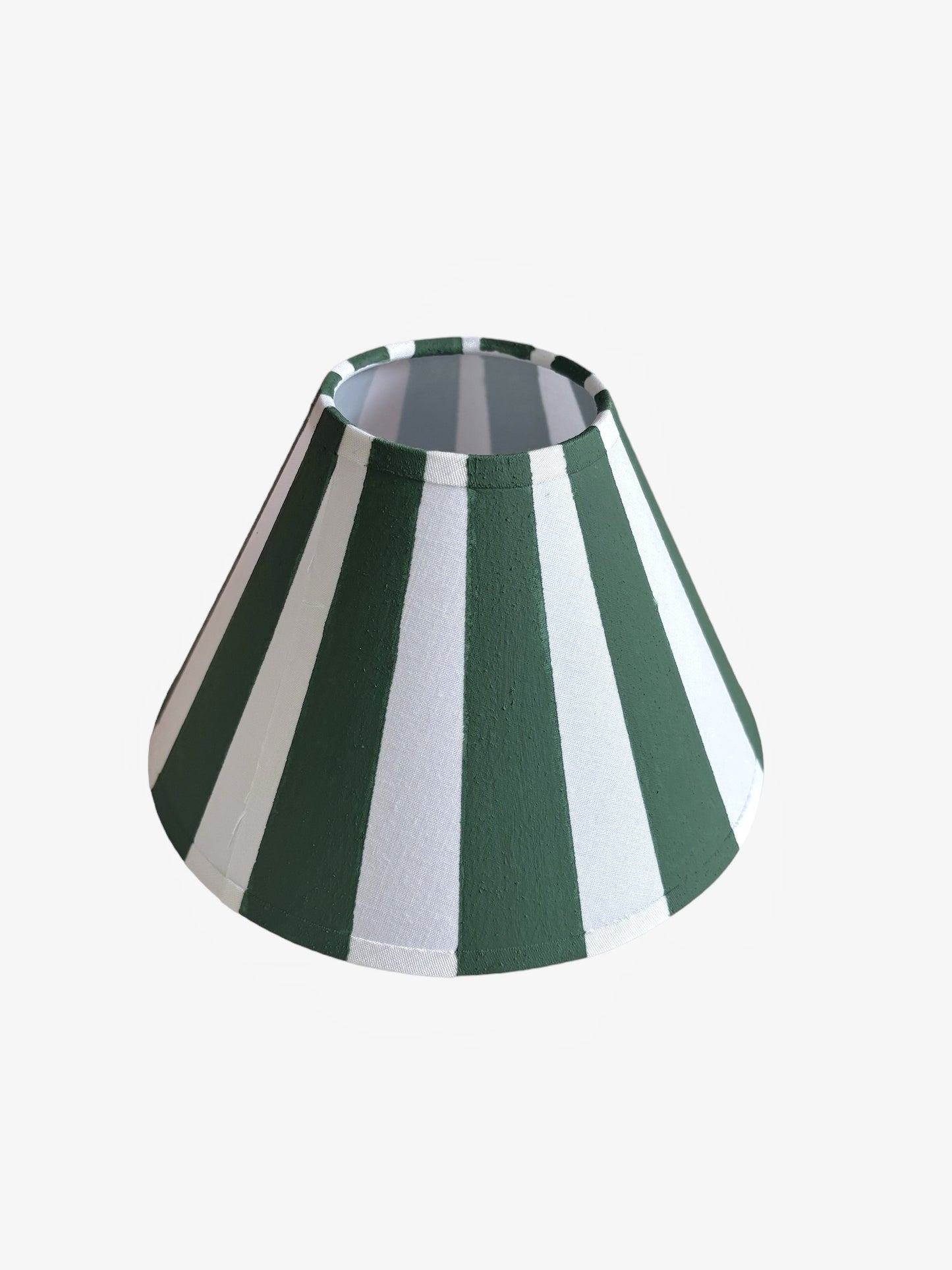 A hand-painted green and white candy striped lampshade
