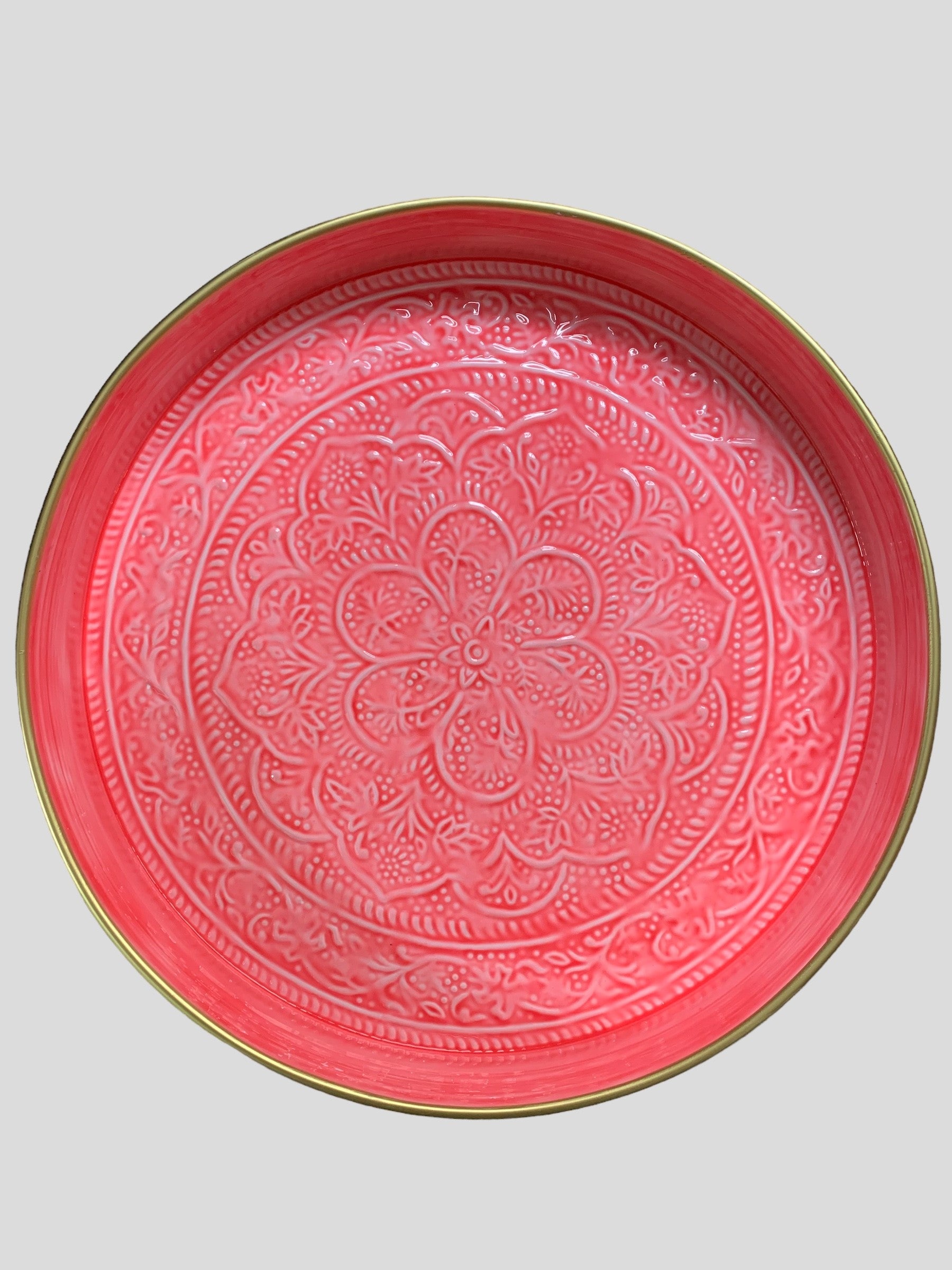 A large bright pink enamel tray from India