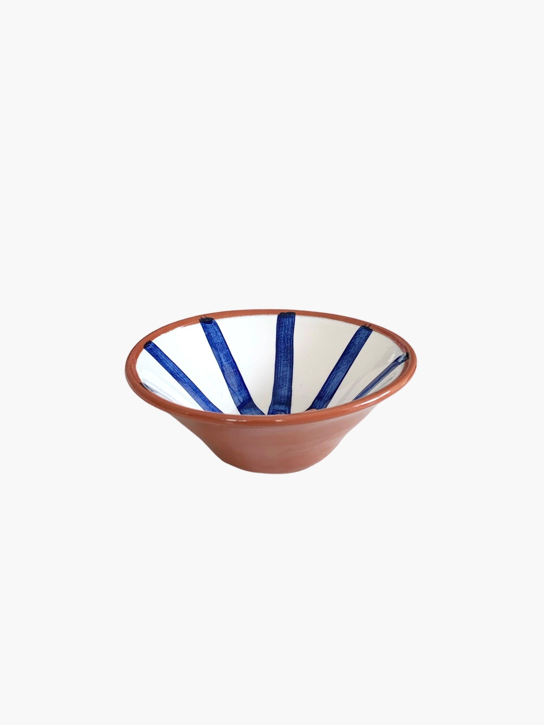 mini ceramic bowl hand-painted with a blue and white segment design.  Made in portugal by casa cubista