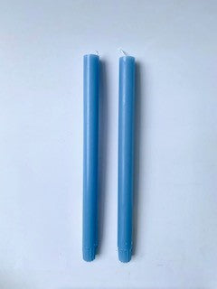 A pair of sky blue candles from True Grace