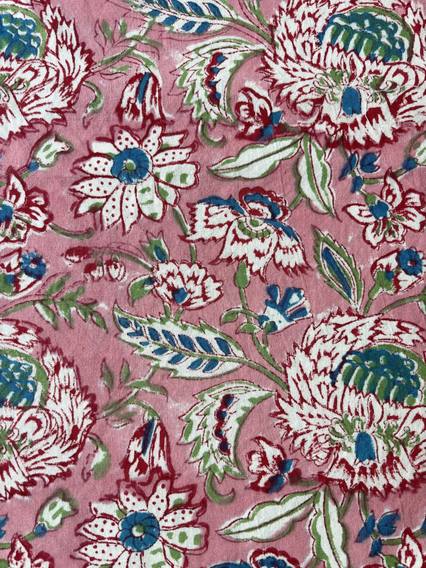 Floral patterned fabric with pink background