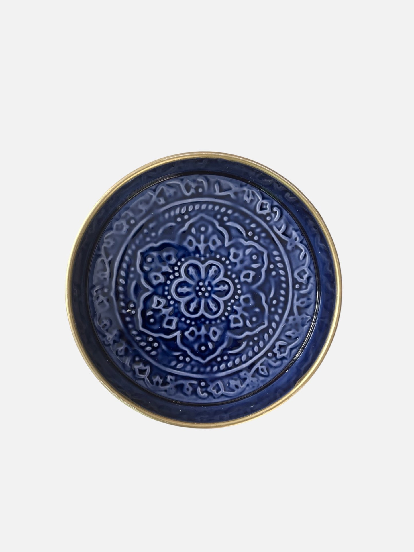 A small sized enamel tray in a dark blue colour with embossed floral design.