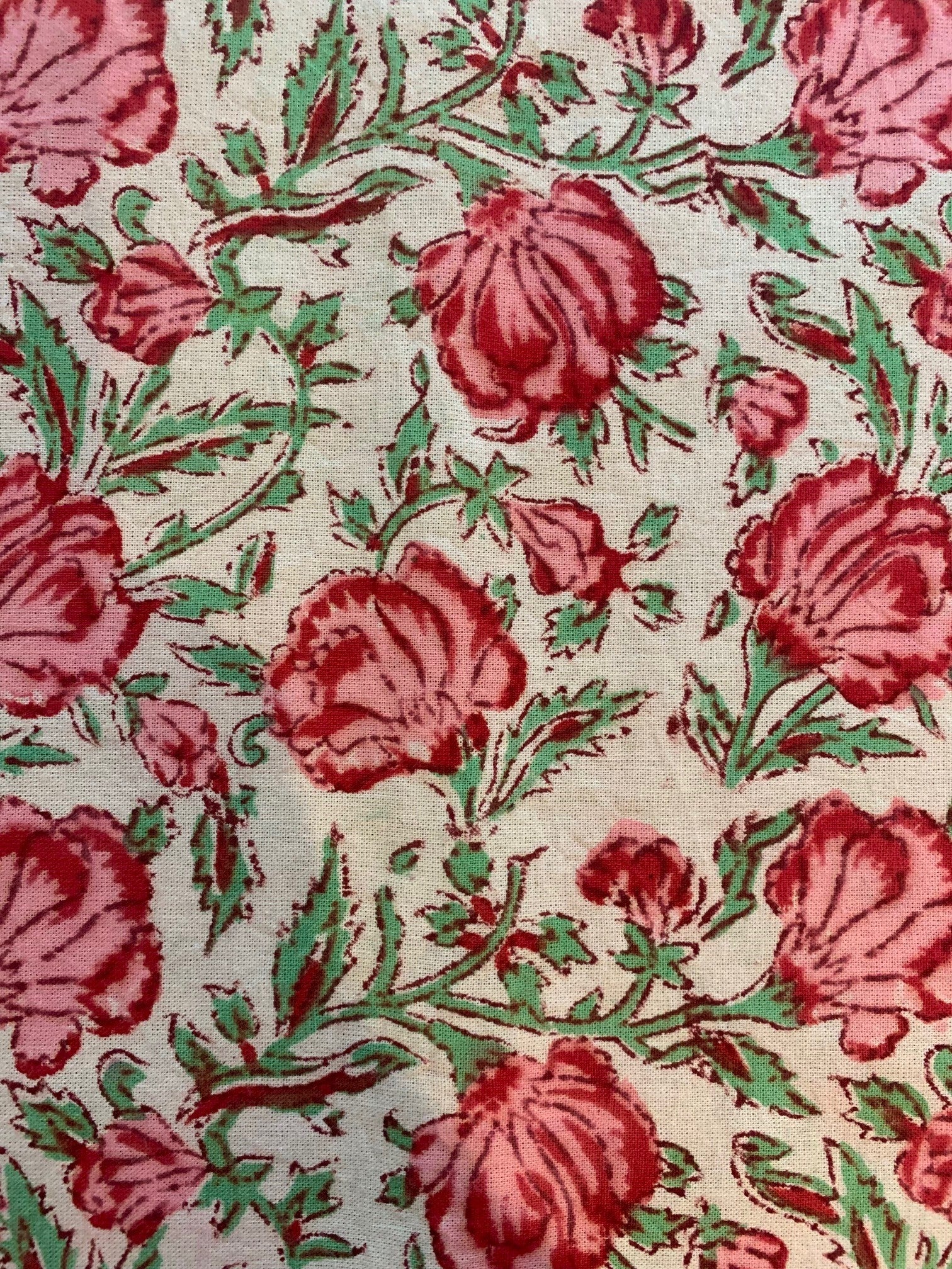 Pink and green floral block print tablecloth.