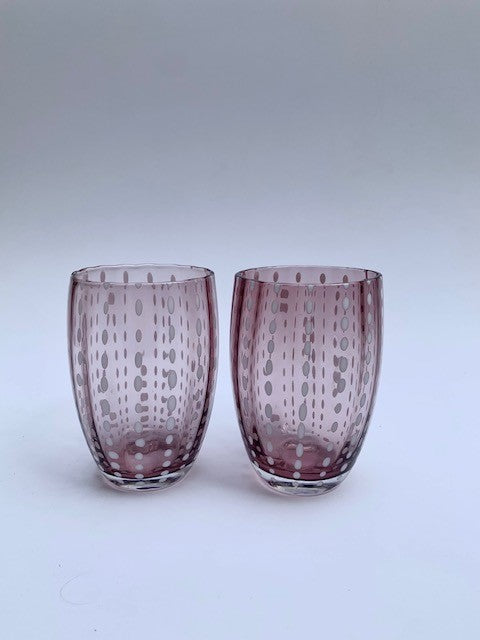 Two pink glass tumblers with perle design.